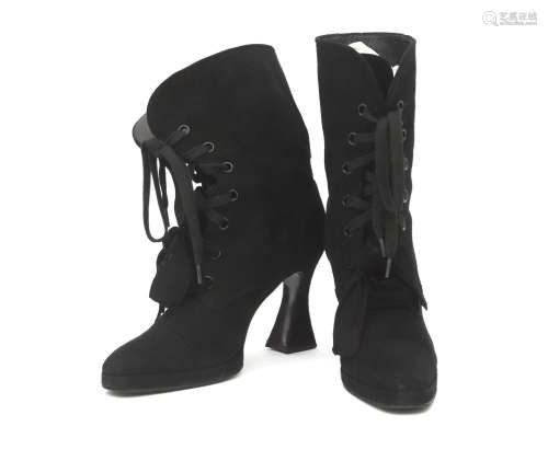 A pair of black suède lace-up boots, size 38. With platform,...