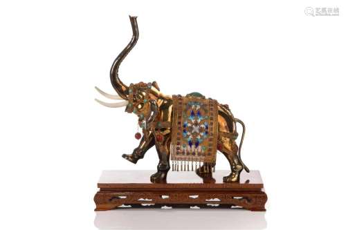 CHINESE GILT COPPER FIGURINE OF AN ELEPHANT