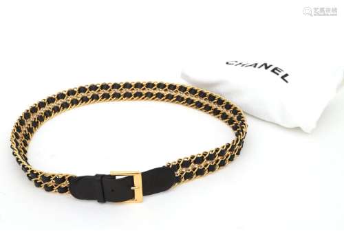 A black leather Chanel belt with twisted links. Chanel black...
