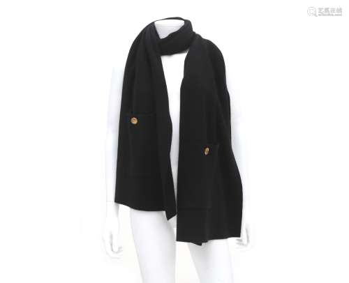 A black Chanel scarf with Chanel buttons to close the two po...