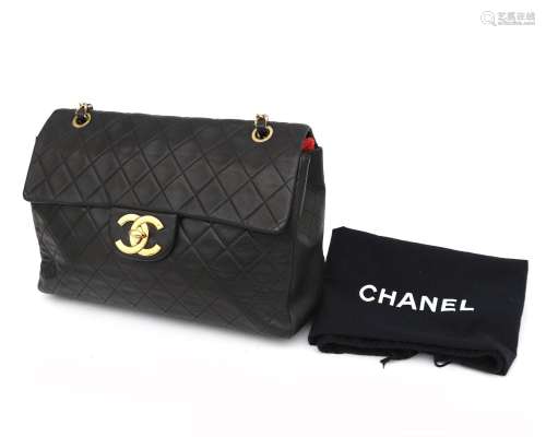 A black leather Chanel schoulder bag, 1989- 1991. Made of qu...