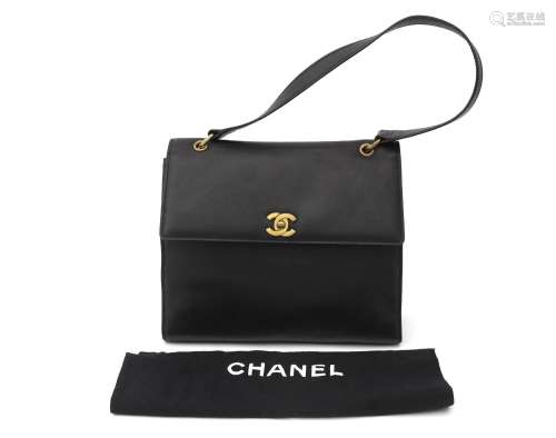 A black caviar leather Chanel bag, ca. 2000 - 2002. Designed...
