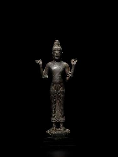 A COPPER ALLOY FIGURE OF AVALOKITESHVARA SRIVIJAYA, SOUTHERN...