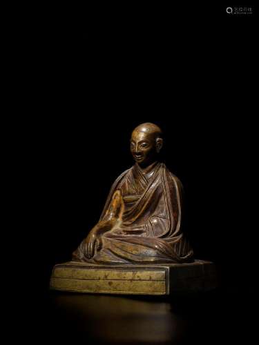 A COPPER ALLOY FIGURE OF THE FIRST PANCHEN LAMA, LOBSANG CHO...