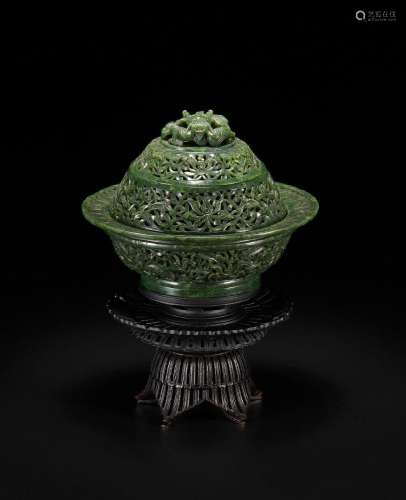 A SPINACH-GREEN JADE RETICULATED CIRCULAR INCENSE BURNER AND...