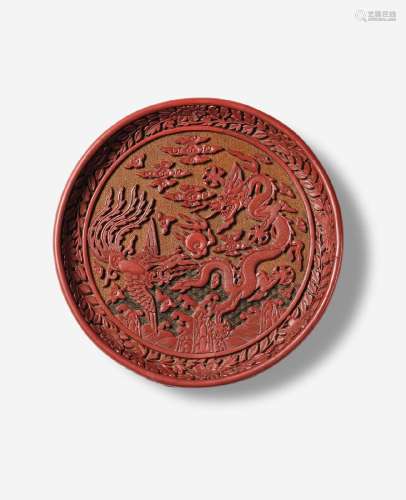 AN IMPERIAL POLYCHROME LACQUER CARVED 'DRAGON AND PHOENIX' D...