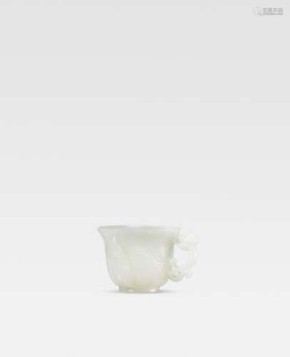 A RARE WHITE JADE 'CHILONG' CUP 18th century (2)