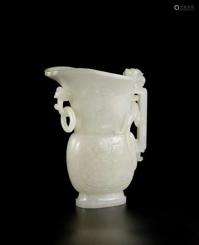 A FINE AND RARE IMPERIAL WHITE JADE ARCHAISTIC 'PHOENIX' VES...