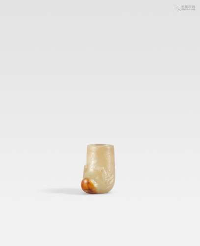 A YELLOW AND RUSSET JADE 'BUFFALO' RHYTON CUP Ming Dynasty (...