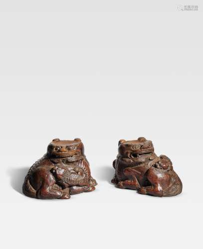 A PAIR OF BAMBOO ROOT CARVED 'LION AND CUB' CUPS Late Ming D...