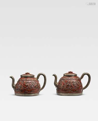 A PAIR OF COCONUT CARVED 'FIGURES AND LANDSCAPE' PEWTER-MOUN...