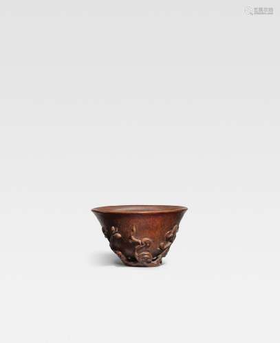 A SMALL BAMBOO CARVED 'MAGNOLIA AND LINGZHI' CUP 17th centur...