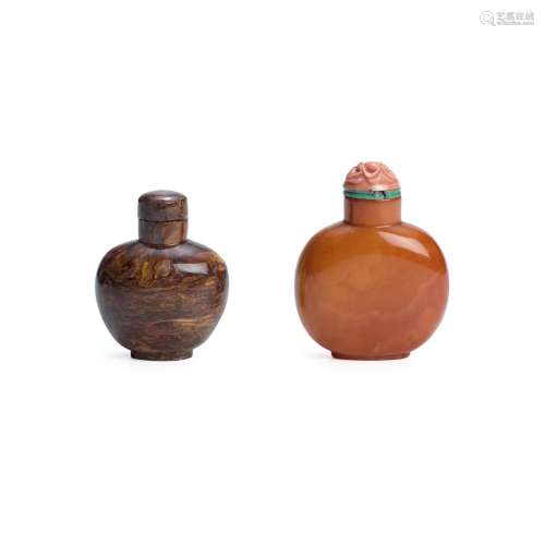 A QUARTZ AND AN AMBER BOTTLE The first: 1850-1920; the secon...