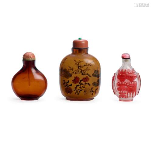 THREE GLASS BOTTLES The first: 1780-1860; the second: 1895-1...