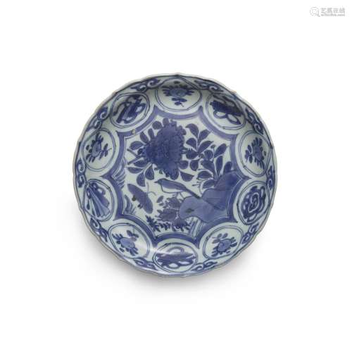 A BLUE AND WHITE DISH WITH BARBED RIM Ming dynasty, Wanli pe...