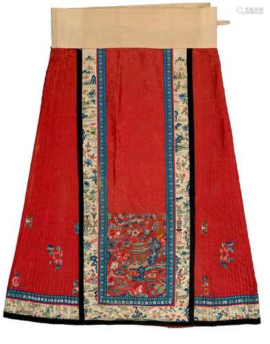 A RED SILK EMBROIDERED PLEATED SKIRT Late 19th-early 20th ce...