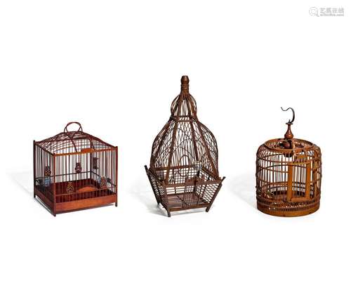 THREE BAMBOO AND WOOD BIRD CAGES WITH PORCELAIN FEEDERS Late...