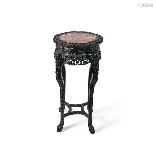 A MARBLE-INLAID CARVED HARDWOOD TALL STAND Late Qing dynasty