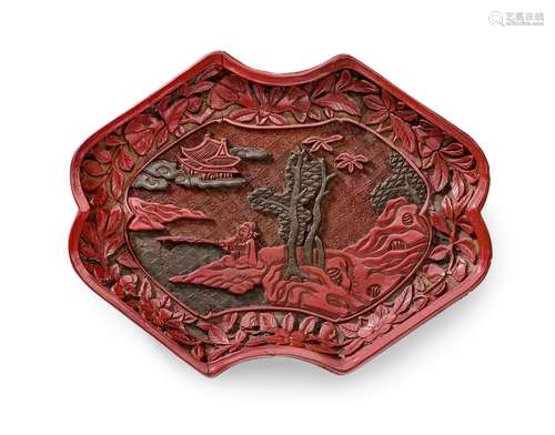 A CARVED CINNABAR AND GREEN LACQUER INGOT-SHAPED TRAY Hongwu...