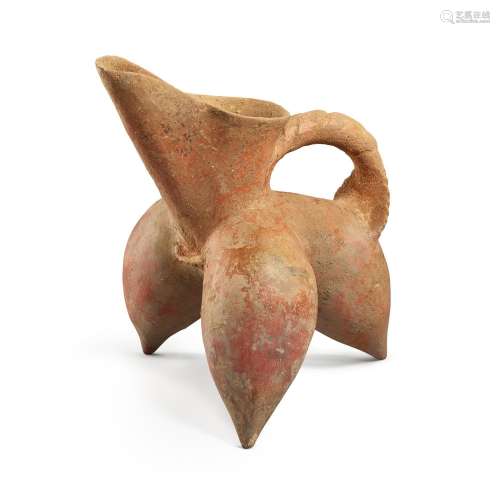 A red pottery tripod ewer, Longshan culture, c. 2500-2000 B....