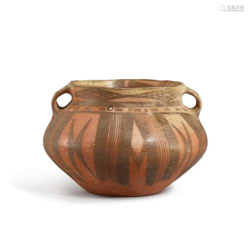 An inlaid painted pottery handled jar, Majiayao culture, Mac...