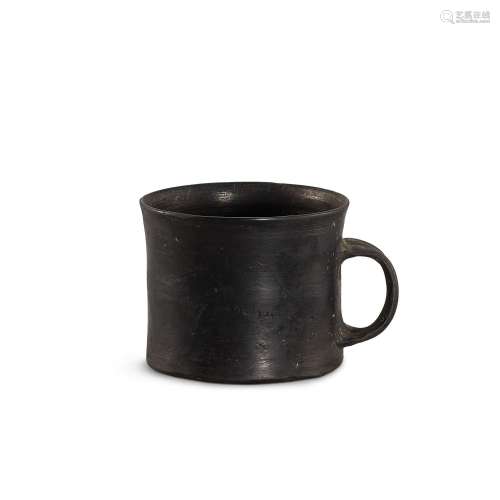 A small black pottery cup, Longshan culture, c. 2500-2000 B....