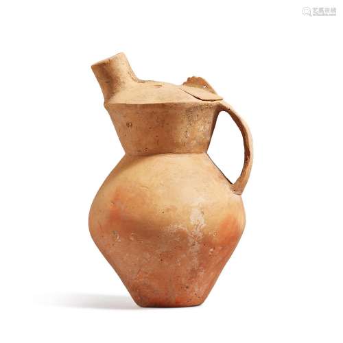 A large pottery owl-form ewer and cover, Qijia culture, 2050...
