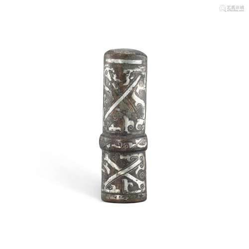 A silver-inlaid bronze chariot fitting, Eastern Zhou dynasty...