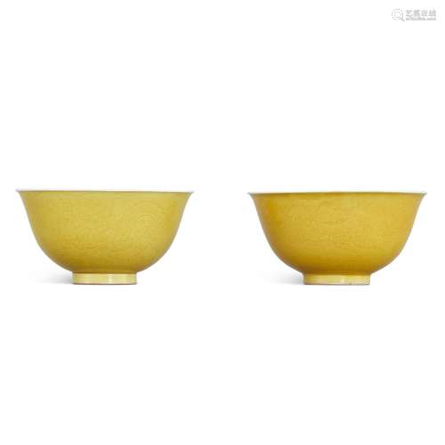 A pair of incised yellow-glazed 'dragon' bowls, Seal...