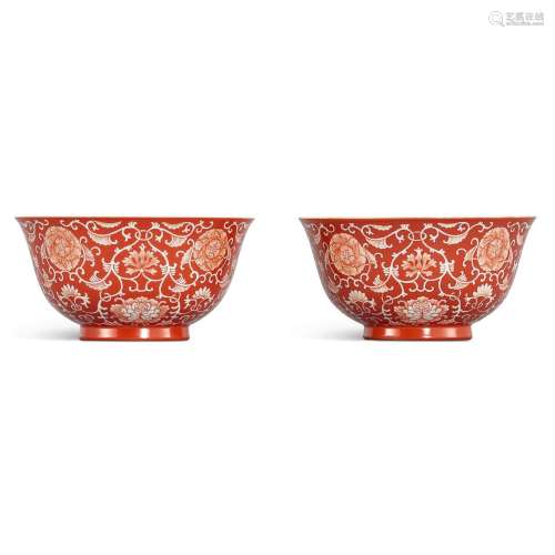 A fine pair of coral-red reverse-decorated 'lotus' b...