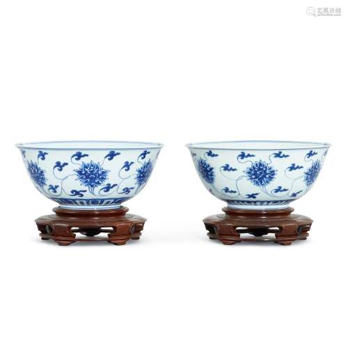 A pair of blue and white 'lotus' bowls, Seal marks a...