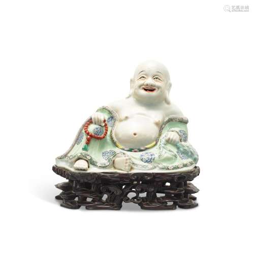 A famille-rose figure of Budai, Qing dynasty, 18th century 清...