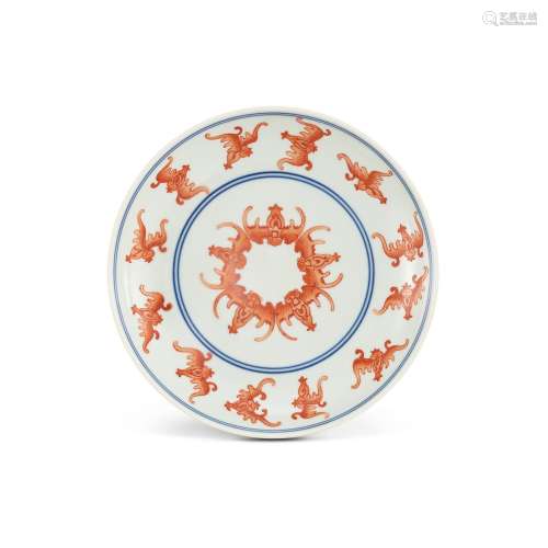 An iron-red and underglaze-blue 'bat' dish, Seal mar...