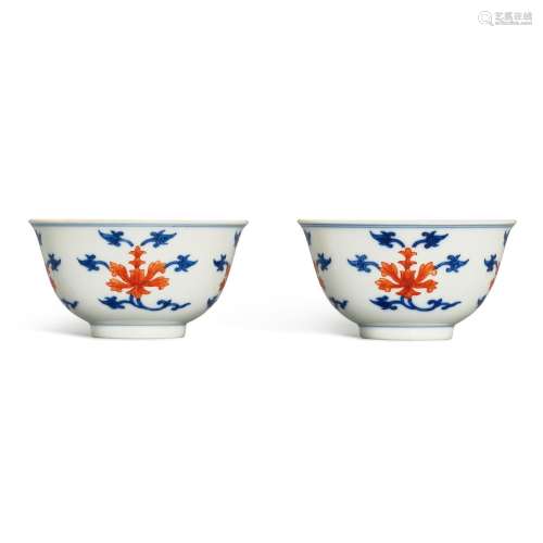 A pair of iron-red and underglaze-blue ‘lotus’ cups, Seal ma...