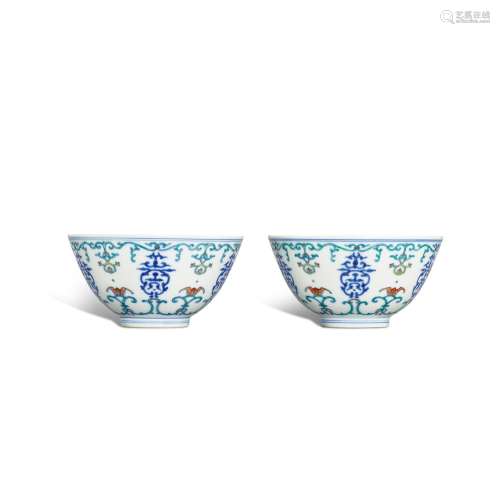 A pair of doucai 'longevity' bowls, Seal marks and p...