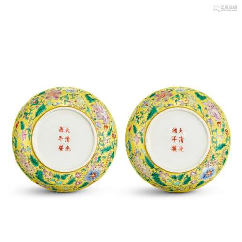 A pair of yellow-ground famille-rose 'floral' dishes...