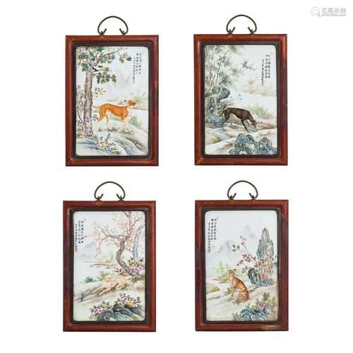 Four inscribed and enamelled porcelain ‘dog’ plaques, Attrib...