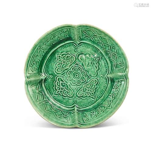 A moulded green-glazed pottery dish, Liao dynasty 遼 綠釉印花...