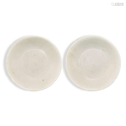 A pair of white-glazed lobed dishes, Sui – Tang dynasty 隋至...