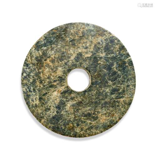 A large calcified green jade bi disc, Neolithic period 新石器...