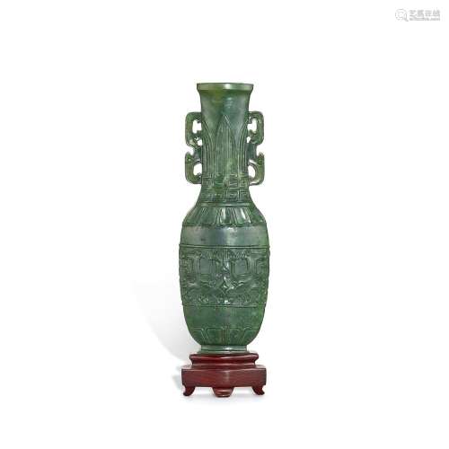 An archaistic spinach-green jade 'taotie' vase, Qing...