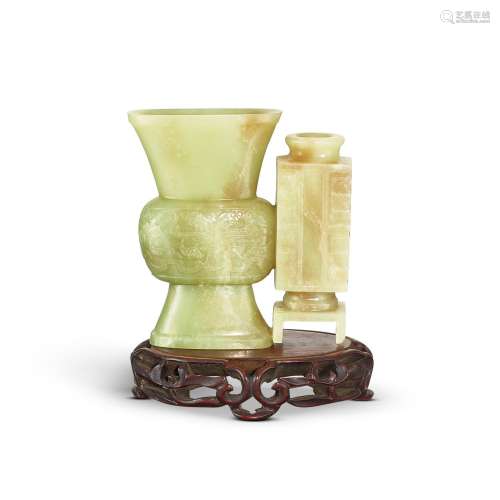 A yellow jade archaistic double vase group, Qing dynasty 清 ...