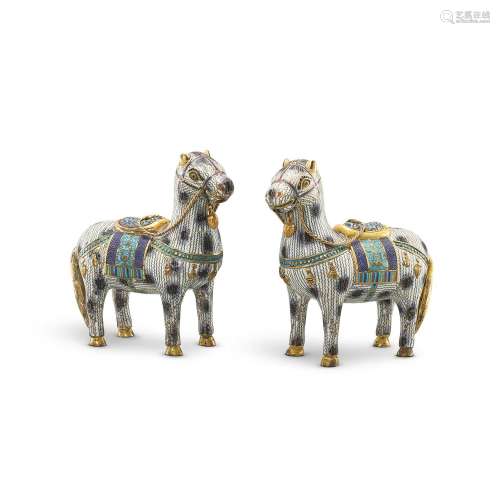 A rare pair of cloisonné enamel horses, Qing dynasty, 18th c...