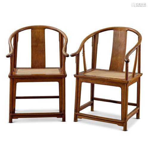 A pair of huanghuali horseshoe-back armchairs, quanyi, Qing ...