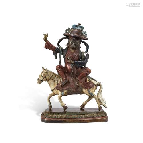 A rare cold-painted and gilt-lacquer bronze figure of Dharma...