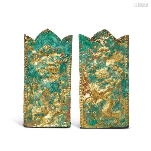 A pair of gilt-bronze 'lion' plaques, Tang-Liao dyna...