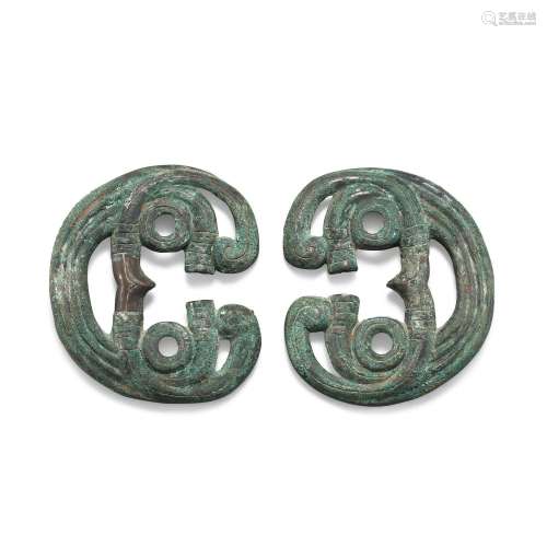 A pair of archaic bronze horse bridle ornaments, Mid-Western...