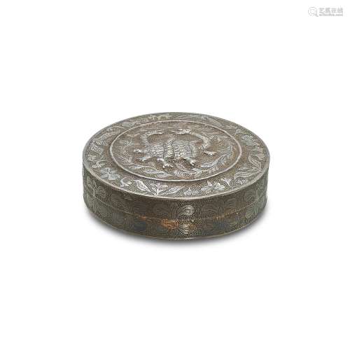 A silver 'mythical beasts' box and cover, Tang dynas...