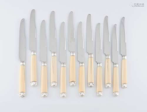 A set of 12 table knives