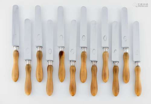 A set of 12 table knives